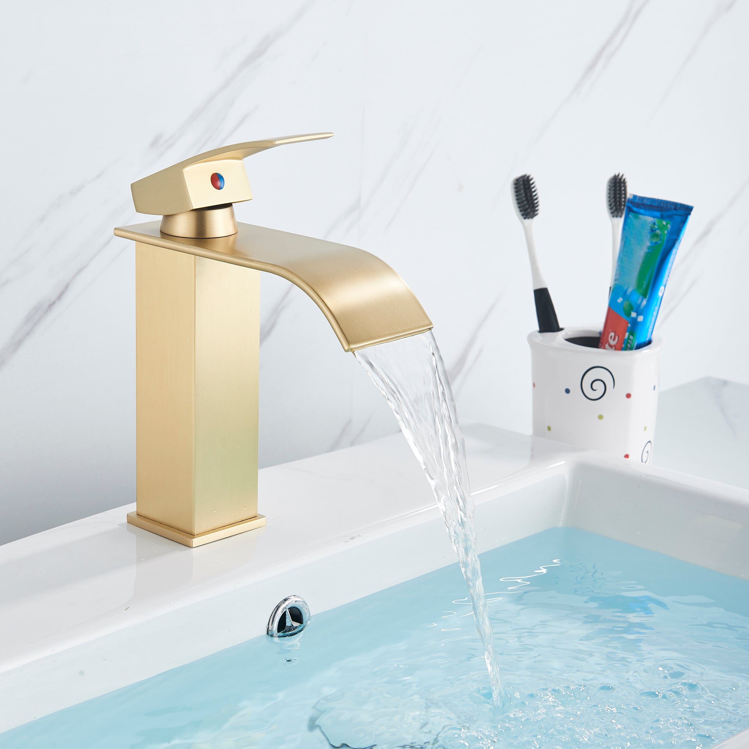 Bateria pentru lavoar Eigens, curgere tip cascada, auriu nichelat