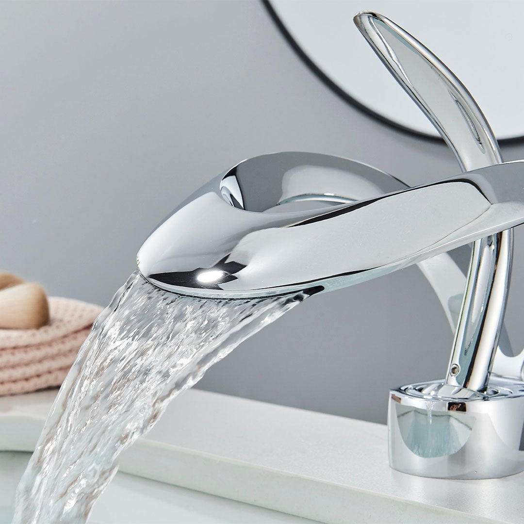 Baterie lavoar cu un singur maner si orificiu, tip cascada, argintiu lucios