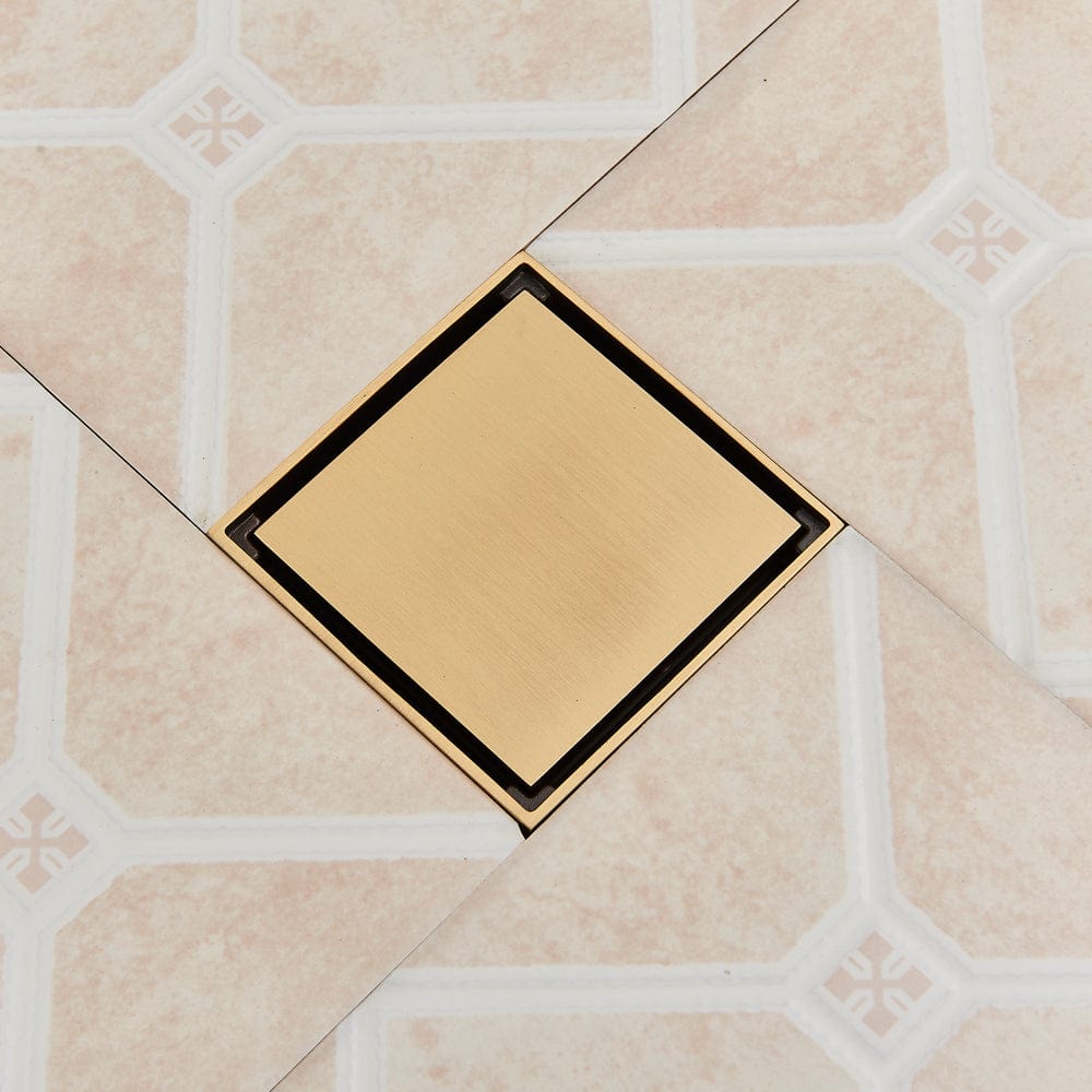 Sifon de pardoseala antimiros, cu iesire verticala, diametru ramă 100 mm, diametru scurgere 38 mm, doua fețe suport fixare placa gresie, auriu nichelat